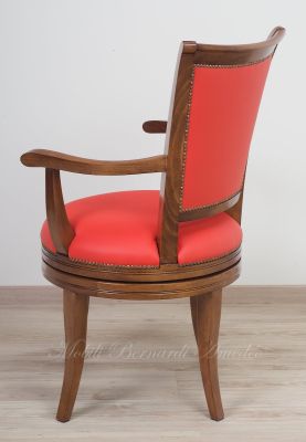 Classic style study swivel chair padded and covered with genuine orange Italian leather