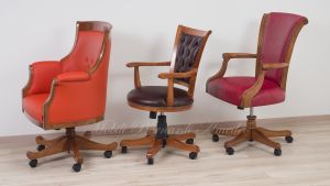 Poltrone girevoli stile classico fatte a mano in Italia con rivestimento in vera pelle