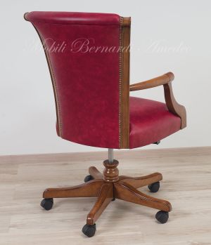 Poltrona girevole con rotelle stile classico seduta e schienale imbottiti vera pelle