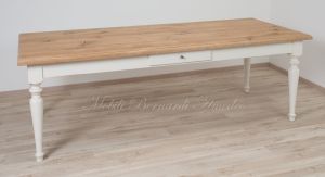 Solid wood table with turned legs and natural oak top with hand-planed knots