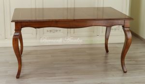 Table with central extensions in walnut