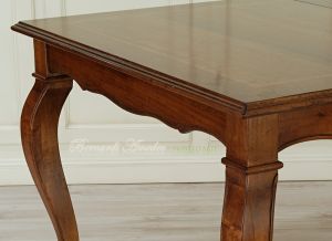 Table with central extensions in walnut