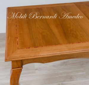 Tavolo da pranzo in legno massello di noce nazionale stile classico-contemporaneo con gambe curve e prolunga centrale