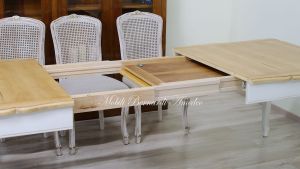 Tavolo con prolunghe e piano in noce chiaro
