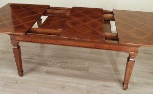 Tavolo classico con prolunghe centrali realizzato a mano in legno di noce