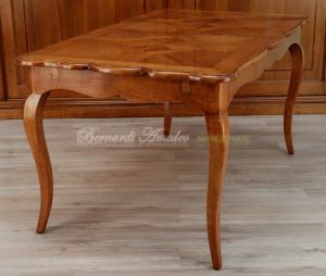 Tavolo in legno di ciliegio con prolunghe centrali