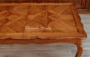 Tavolo in legno di ciliegio con prolunghe centrali