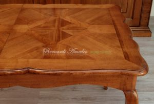 Tavolo in legno di ciliegio con prolunghe centrali