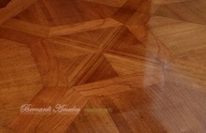 Tavolo in legno di ciliegio con prolunghe centrali