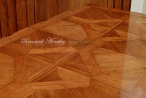Tavolo in legno di ciliegio con prolunghe centrali