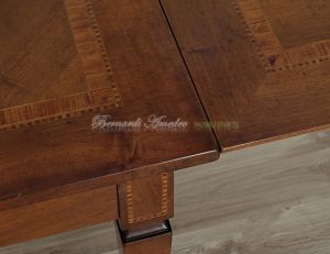 Tavolo in legno con prolunghe piano lavorato