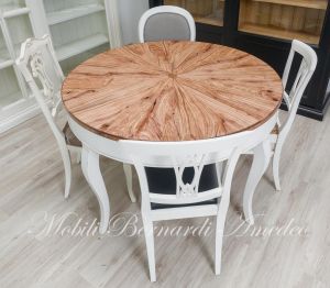 Round table handcrafted with olive wood and additional extensions