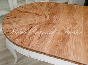 Round table handcrafted with olive wood and additional extensions
