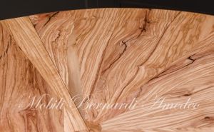 Round table handcrafted with olive wood and additional extensions