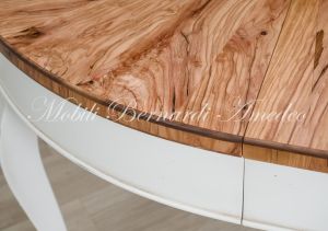 Round table handcrafted with olive wood and additional extensions