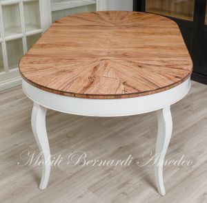 Round table handcrafted with olive wood and additional extensions