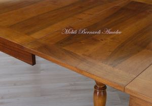 Tavolo da pranzo di grandi dimensioni con prolunghe centrali