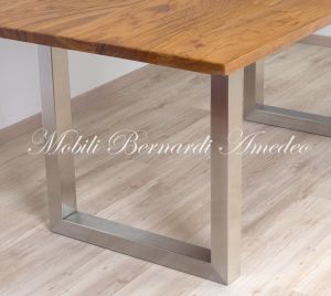 Modern style dining table with light olive wood top and stainless steel legs