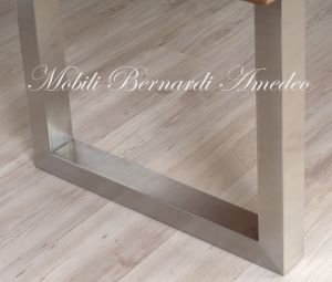 Modern style dining table with light olive wood top and stainless steel legs
