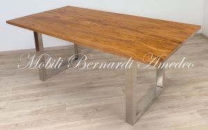 Modern style dining table with light olive wood top and stainless steel legs