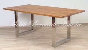 Modern style dining table with light olive wood top and stainless steel legs