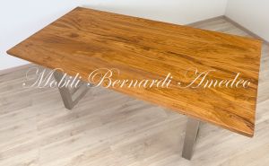 Modern style dining table with light olive wood top and stainless steel legs