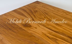 Modern style dining table with light olive wood top and stainless steel legs