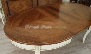 Tavolo da pranzo ovale con prolunghe in legno