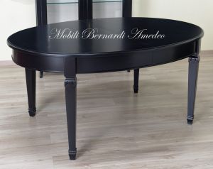 Tavolo ovale in legno con prolunghe centrali