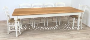 Dining table handcrafted in solid wood with light oak top and country style white turned legs