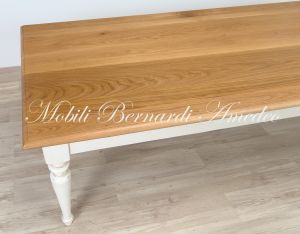 Dining table handcrafted in solid wood with light oak top and country style white turned legs