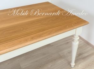 Dining table handcrafted in solid wood with light oak top and country style white turned legs