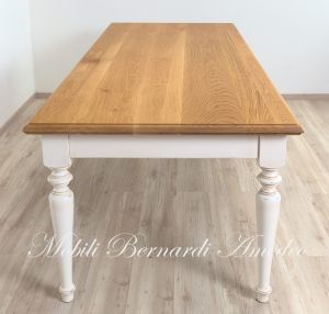 Dining table handcrafted in solid wood with light oak top and country style white turned legs