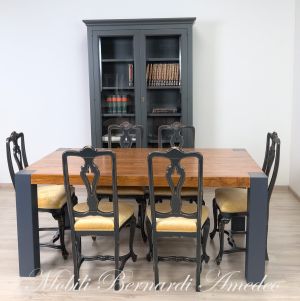Modern table in solid olive wood and iron legs