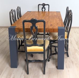 Modern table in solid olive wood and iron legs
