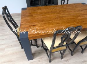Modern table in solid olive wood and iron legs