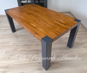 Modern table in solid olive wood and iron legs