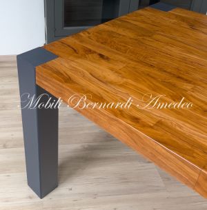 Modern table in solid olive wood and iron legs