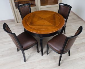Tavolo rotondo stile classico finitura bicolore nero e noce con sedie classiche imbottite e rivestite in pelle