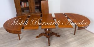 TA927 Tavolo rotondo in legno con 4 prolunghe diametro 130 cm