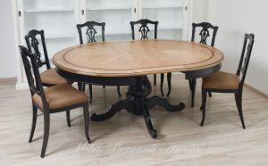 Tavolo rotondo allungabile in legno finitura nero e rovere chiaro con sedie classiche imbottite