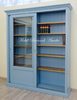 Libreria 2 ante scorrevoli finitura bicolore azzurro legno