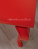 Tavolo allungabile colore rosso - dettaglio piano e gamba