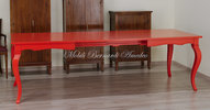 Tavolo colore rosso in legno con 2 allunghe inserite