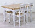 Tavolo allungabile bicolore e sedie bianche